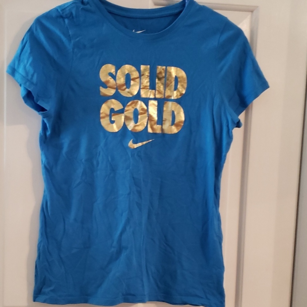 Nike solid gold